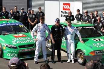 Johnson flanked by drivers Chaz Mostert and Dale Wood