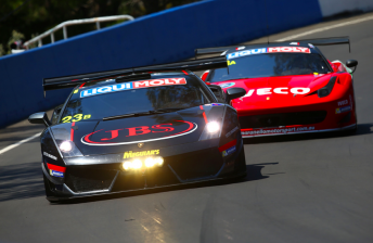 The JBS Lamborghini and Maranello Ferrari during practice