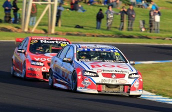 Jason Bright and Craig Lowndes duke it out at Phillip Island