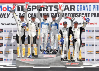 Richard Westbrook and Ryan Briscoe celebrate a third GTLM victory 