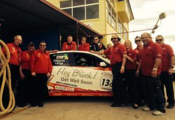 The Osborne team displaying a get well message for Giblin at Queensland Raceway last month