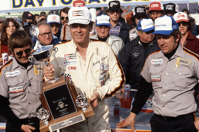  Buddy Baker celebrates his victory in the Daytona 500 after leading 143 of the 200 laps in 1980