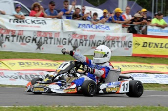 Pierce Lehane crossing the line for victory in the Pro Junior (KF3) category. Pic: photowagon.com.au