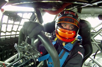 Cameron Waters behind the wheel of the #77 Shannons Mars Racing Commodore