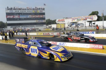 Ron Capps (near lane) and Matt Hagan face off in the Funny Car final