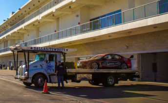 A Chevrolet-badged V8 Supercar in the Circuit of the Americas pitlane. pic: autoguide.com.