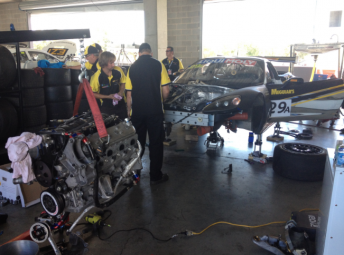 The Corvette being worked on in the Trofeo garage
