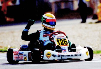 James Courtney crossing the line for victory in the 1997 World Karting Championship