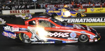 Courtney Force (near lane) blasts off in the Winternationals final against Ron Capps (PIC: NHRA.com)