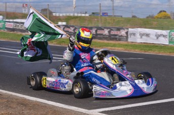 Matthew Waters on his victory lap after claiming the Pro Light (KF) Championship (Pic: AF Images/Budd)