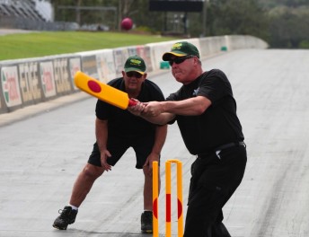 Gary Densham plays wicket-keeper while Jack Wyatt wields the batt as the US stars come to grips with the Aussie game (credit - blacktrack.com.au)