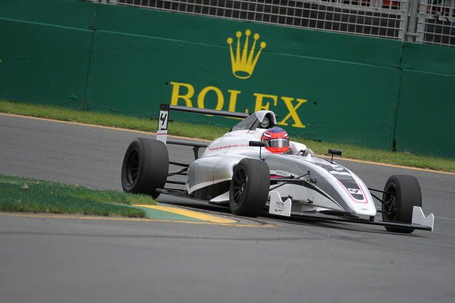 The FIA Formula 4 promotional car undertaking a demonstration at the 2014 Australian Grand Prix
