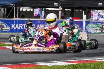 Chris Sandrone leading Andrew Kahl in the Pro Junior (KFJ) category during Saturday