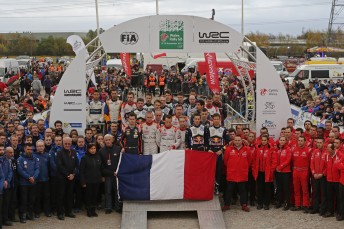All crews gather to show their support for the people of France on the podium
