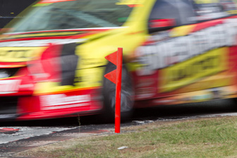 Russell Ingall dodges a bollard at Surfers Paradise