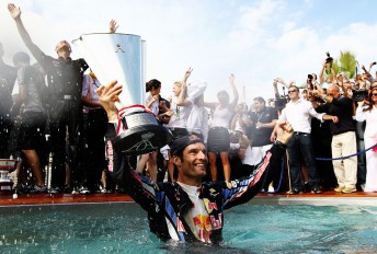 Mark Webber taking a victory plunge at Monaco in 2010