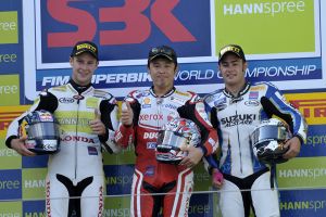 Haga with Rae and Haslam on the podium after race 2 in Germany