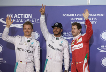 Lewis Hamilton pipped Nico Rosberg and Sebastian Vettel to pole position