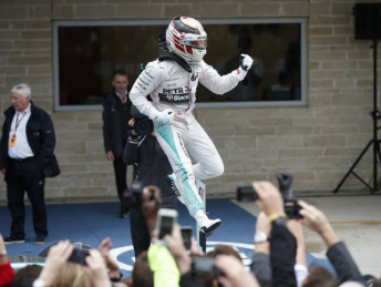 Lewis Hamilton celebrates third world title