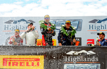 Coulthard and Quinn celebrate on the podium