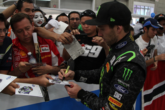 Atko signs a few pieces of memorabilia for the fans