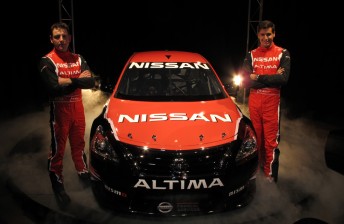 Todd and Rick Kelly flank their first Altima at the launch