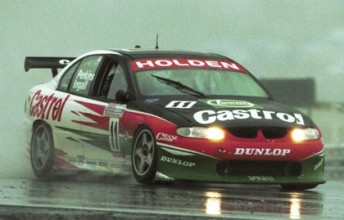 Larry Perkins and Russell Ingall on their way to victory at the Sandown 500 in 1999