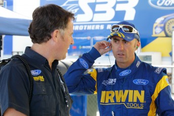 IRWIN Race Engineer Dave Stuart talks with Brabham at Queensland Raceway 