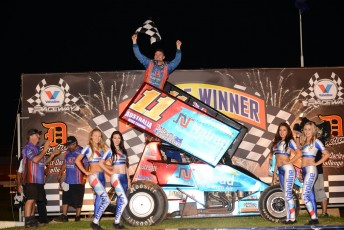 Trevor Green crests the top of his Natrad #11 in the Darley Challenge victory lane