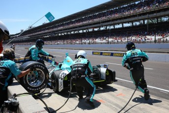 The #33 KV Racing crew attend James Davison during the Indy 500 