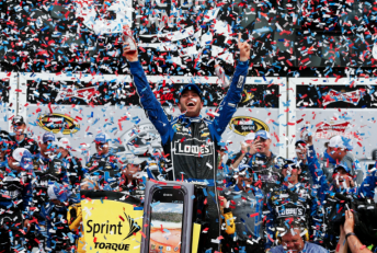 Jimmie Johnson won his second Daytona 500 by beating home team-mate Dale Earnhardt Jr