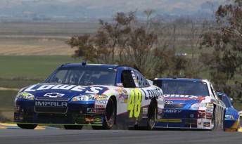 Jimmie Johnson leads Marcos Ambrose at Infineon Raceway