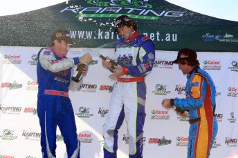 Josh Tynan celebrates his epic KF2 win with Matthew Waters (L) and Troy Loeskow (R)