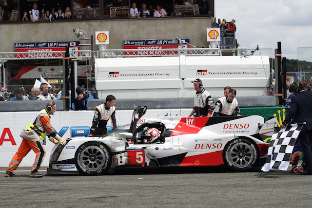 Kazuki Nakajima sits devastated in the cockpit of the which was minutes away from supplying Toyota with its maiden Le Mans win