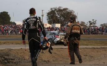 Todd Kelly retrieves his Altima with a V8 Supercars official after Race 5 in Tasmania