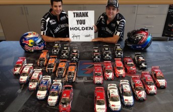 The Kelly brothers with a collection of models of their Holden race cars