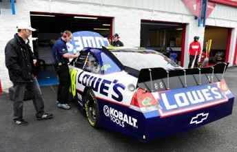 #48 Crew Chief Chad Knaus looks over the new rear spoiler on Jimmie Johnson