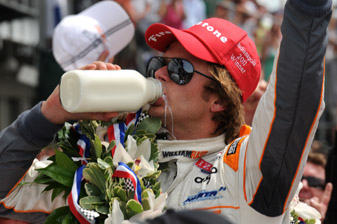 Dan Wheldon celebrating his Indy 500 win earlier this year