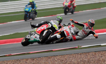 Jack Miller collides with LCR team-mate Cal Crutchlow while battling over third position at Silverstone