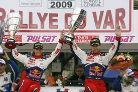 Severine and Sebastien Loeb celebrate winning the Rallye du Var.