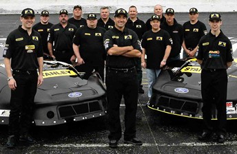 Clayton Pye, Marcos Ambrose and Ben Rhodes with the Marcos Ambrose Motorsport squad