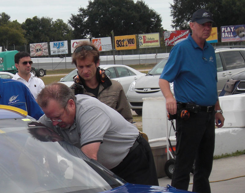 Jarno Trulli eagerly awaits his turn behind the wheel as MWR Competition Director Steve Hallam looks on