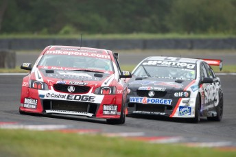 Greg Murphy wins from an unlucky Simon Evans. Pic: Andrew Bright