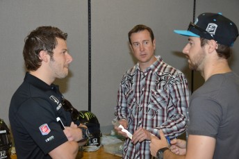 Indy 500 team-mates Marco Andretti (left) and Kurt Busch talk with James Hinchcliffe (right)