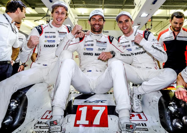 Mark Webber celebrates his FIA WEC title win with team-mates Brendon Hartley and Timo Bernhard