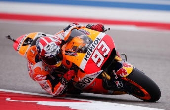 Marc Marquez has take pole in a stunning finish to qualifying on his spare bike