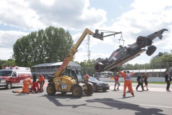 The marshal receives immediate attention after being struck by the mobile crane