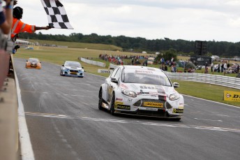 Mat Jackson takes the flag in Race 2 Pic PSP Images