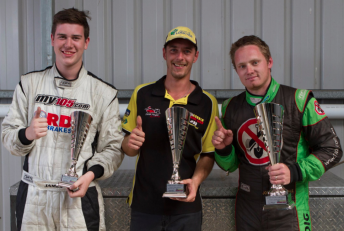 Jon McCorkindale (centre) celebrates round win 