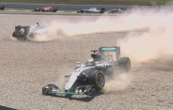 Lewis Hamilton and Nico Rosberg collide on the opening lap of the race